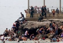 Spain sending troops as thousands enter enclave of Ceuta from Morocco