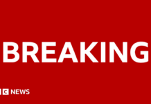 More than 150 migrants rescued after boat catches fire in Channel, French authorities say