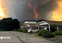 ‘Total incinerated destruction’: Canada wildfire evacuees wonder if they still have homes